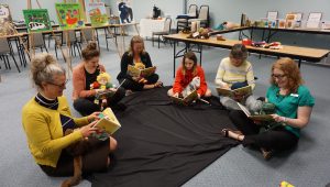 Sharing board books with little ones.